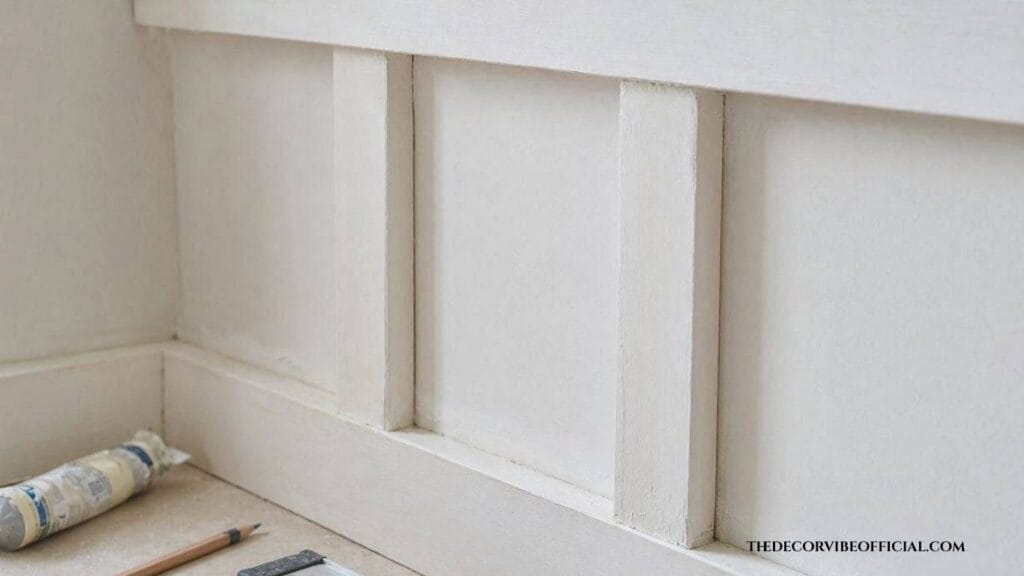 Unpainted board and batten wall anatomy showing baseboard, battens, and top rail
Board and batten wall ideas