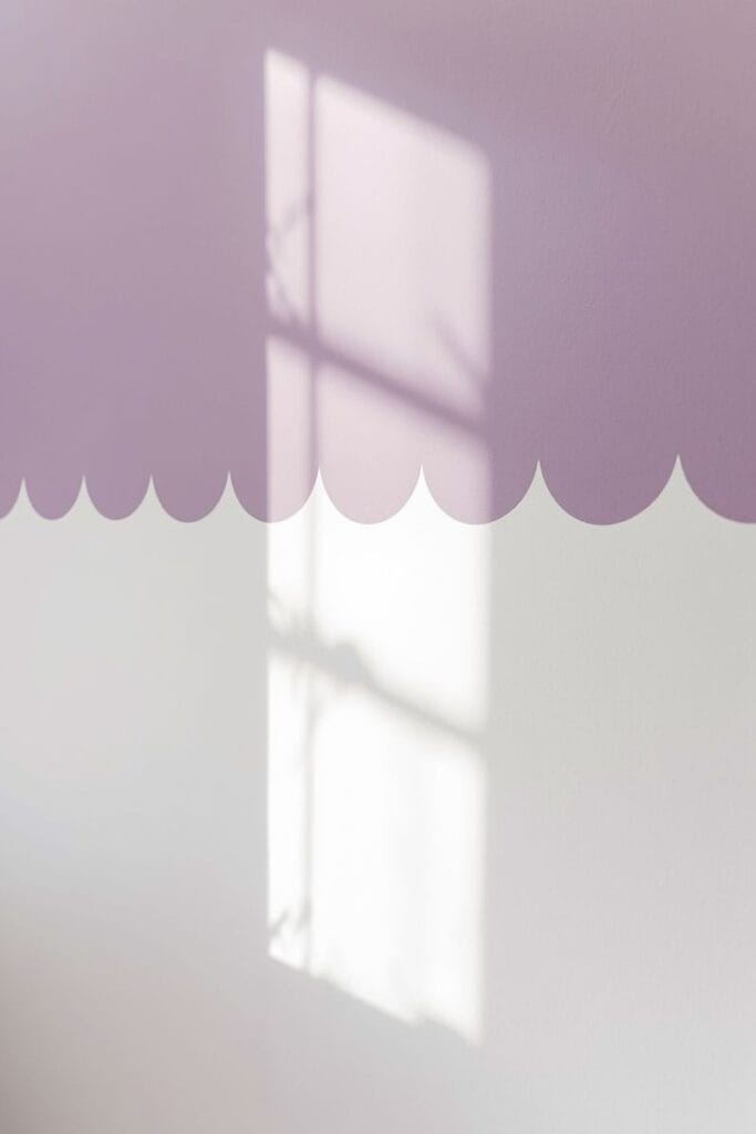 Lavender scalloped border toddler girl bedroom accent wall
