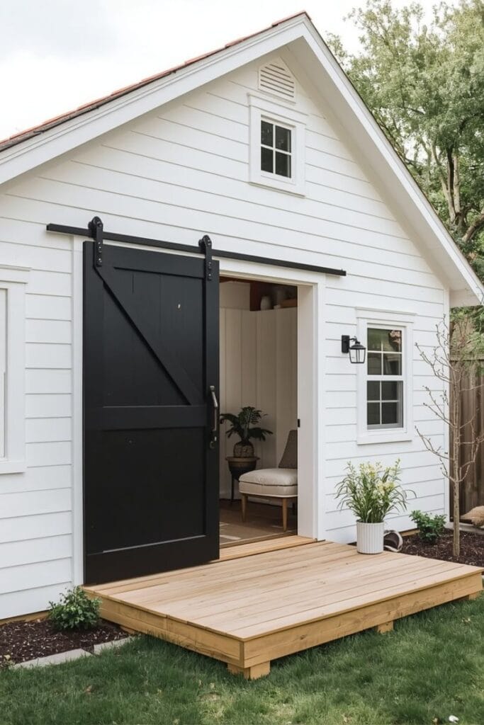ackyard office ideas with a farmhouse barn door and gambrel roof