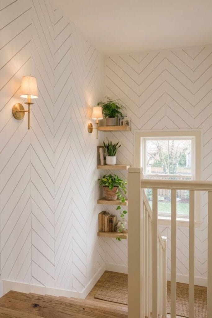 Herringbone wood paneling staircase wall and landing decor.