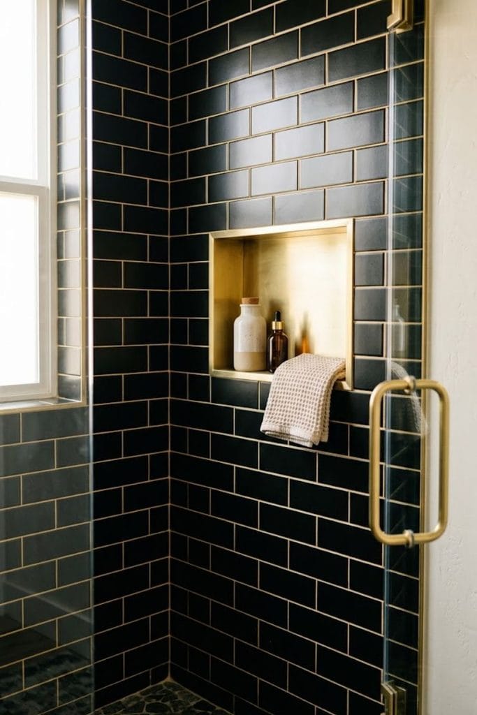 Black and gold bathroom decor subway tile with gold grout lines